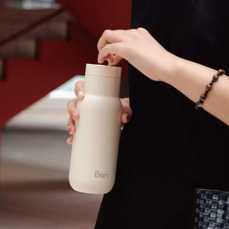 Portable Insulated Cup with One-Touch Press Lid